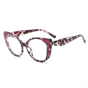Fashionable TR90 large frame anti-blue light glasses for women, chic color-block cat eye design.