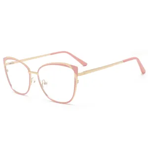Stylish metal frame anti-blue light glasses for women, chic pink and gold cat-eye eyewear.