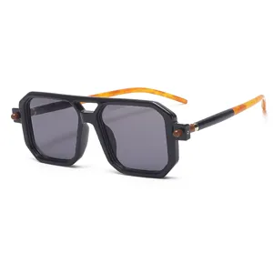 Chunky square frame sunglasses with double bridge and unique tortoiseshell temples.