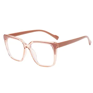 Fashionable square blue light blocking glasses for women with trendy contrast color frame.
