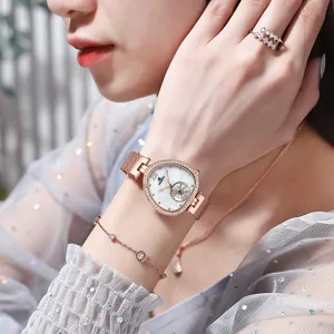 Élégante montre quartz femme or rose avec strass cadran nacre et bracelet maille vue principale