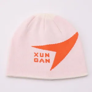 Pink knit beanie hat detail, jacquard orange arrow letter design, casual winter headwear.