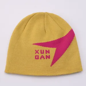 Yellow knit beanie with pink jacquard graphic and letter design, stylish winter cold hat.