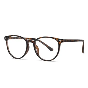Tortoise shell optical glasses frame detail, lightweight TR90 material, stylish cat-eye design.