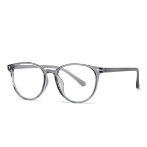 Clear grey TR90 optical glasses frame lightweight round prescription eyewear with delicate metal detail.