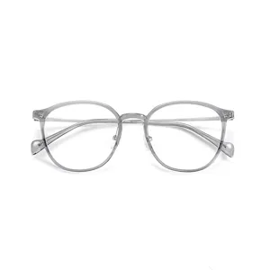 Detailed view of lightweight retro clear frame glasses with metal temples for everyday wear.