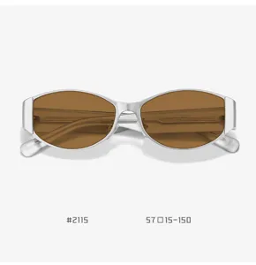 Detail shot of women's retro cat-eye metal sunglasses with brown lenses and sleek frame.