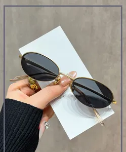 Retro oval metal sunglasses for women and men, stylish UV400 sun protection eyewear.