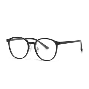Close-up detail of the black round TR90 eyeglasses frame featuring flexible silicone nose pads.
