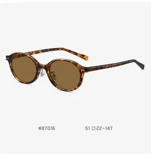 Retro TR90 small oval sunglasses for men and women, classic tortoise frame with brown polarized lenses.