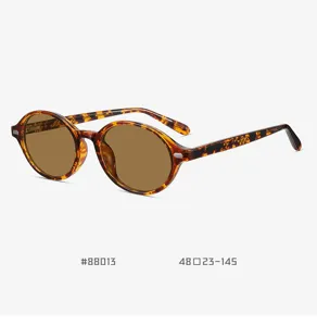 Retro oval tortoise shell polarized sunglasses detail, TR90 frame with brown lenses.