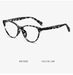 Detail shot of TR90 vintage optical glasses frame in black tortoise pattern with clear lenses.
