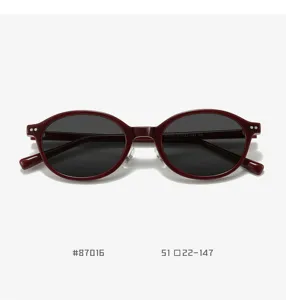 Vintage red oval sunglasses for men and women, trendy TR90 polarized sun eyewear UV400.