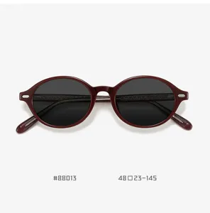 Vintage oval TR90 polarized sunglasses for men and women, classic retro design detail view.