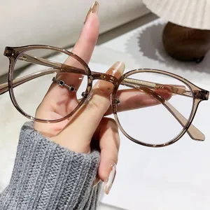 Women TR90 anti-blue light round glasses frame, stylish lightweight optical eyewear for daily wear.