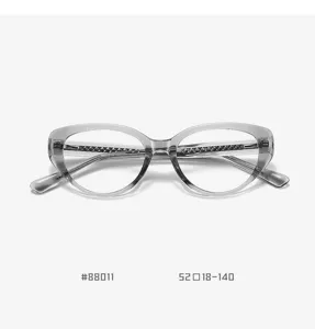 Translucent grey TR90 cat-eye eyeglass frame with stylish metal temple details for daily wear.