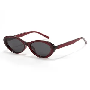 Retro cat-eye polarized sunglasses for women and men, stylish dark red TR90 frame.