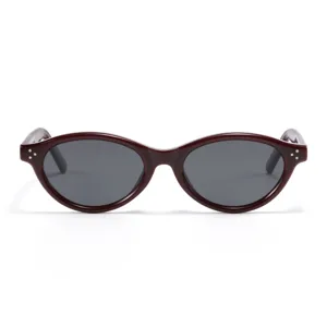Retro oval cat eye polarized sunglasses for women and men, stylish burgundy frames with grey lenses.