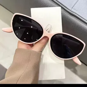 Chic pink frame cat eye sunglasses for women, elegant UV protection polarized eyewear.