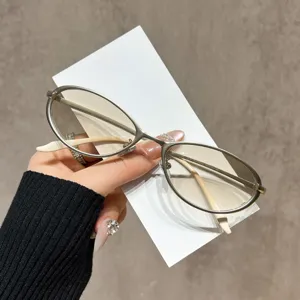 Stylish metal cat-eye sunglasses with gradient lenses and slim frames for daily wear.