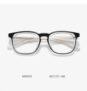 Trendy anti-blue light glasses with clear black frame and metal pin design, unisex style.