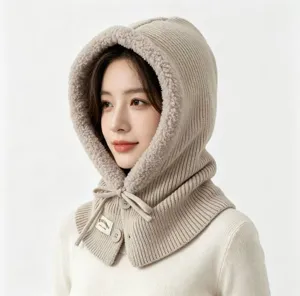 Knit balaclava detail shot showing soft fleece lining, cozy hood design and cozy beige color.