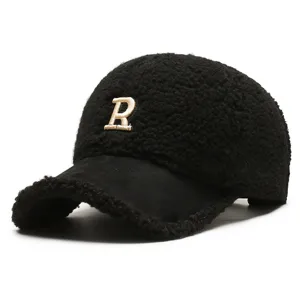 Black sherpa baseball cap for women, winter warm plush cap with embroidered R letter design.