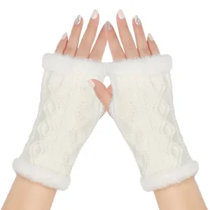 White knitted fingerless gloves detail showcasing cozy plush trim and soft cable knit texture.