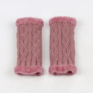 Close-up detail of plush faux fur trim and classic cable knit pattern on winter arm warmers.