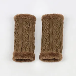 Cozy brown knit arm warmers with plush faux fur trim, perfect for cold autumn and winter days.