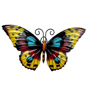 Detailed view of colorful metal butterfly wall art, featuring vibrant hand-painted finish.