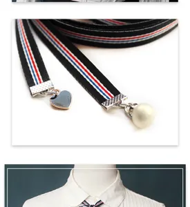 Close-up detail of the preppy striped ribbon bow tie with heart and pearl pendants for shirts.