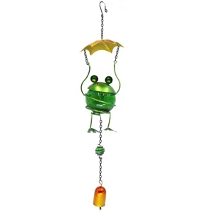 Detailed view of the cute frog wind chime with cracked glass ball and metal garden pendant.