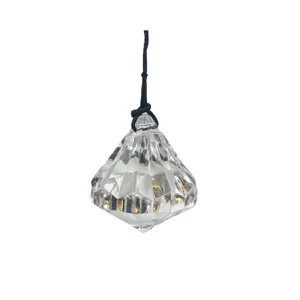 Crystal diamond pendant faceted glass hanging ornament closeup detail view sparkle clear gemstone