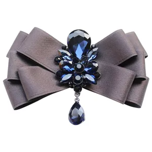 Elegant men's multi-layer ribbon bow brooch with sparkling blue rhinestones for formal suits.