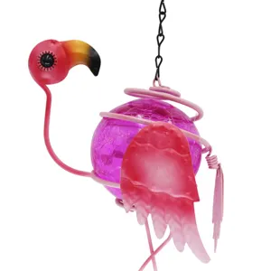 Flamingo wind chime detail, pink cracked glass ball and metal garden hanging ornament design