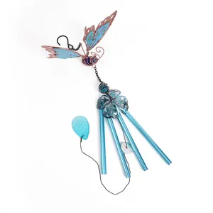 Detailed view of the butterfly metal wind chime with blue acrylic pendant for home and garden decor.