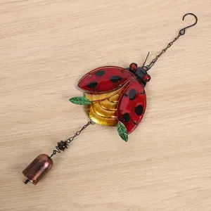 Metal ladybug wind chime with glass painted wings, iron hanging garden decor ornament.