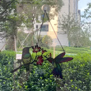 Stained glass hummingbird suncatcher hanging for window, colorful art decor for home.