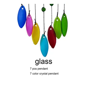 Detailed view of 7 colorful glass leaf pendants with hanging string for wind chimes decor.