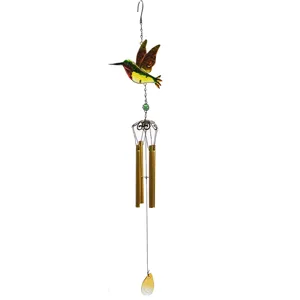 Metal hummingbird wind chime with colorful glass pendant for home garden hanging decor.