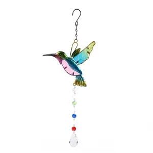 Detailed view of the colorful hummingbird crystal suncatcher pendant with hanging beads.