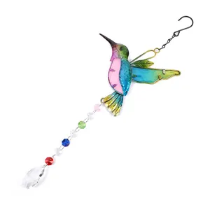 Close-up detail of the colorful metal hummingbird suncatcher pendant with crystal beads.