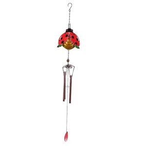 Metal glass ladybug wind chime hanging ornament detail shot showing vibrant red and black colors.