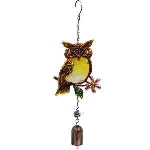 Handcrafted metal owl wind chime with stained glass, perfect for garden and home decor.