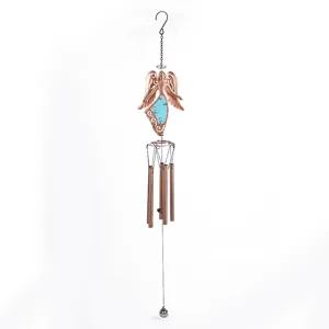 Metal wind chime fairy detail hanging ornament close-up shot for gorgeous garden and room decor.