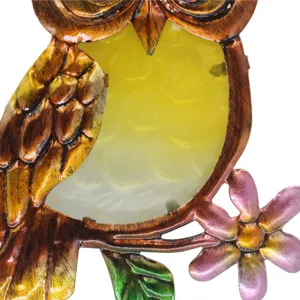 Metal owl wind chime detail, stained glass garden hanging ornament, creative home decor.