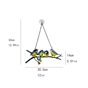 Detailed view of the colorful metal bird hanging ornament, showing product size and structure.