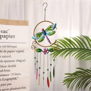 Metal dragonfly wind chime with colorful glass pendants, perfect for indoor and outdoor decor.