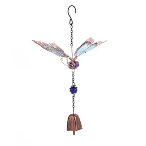 Detailed shot of a butterfly wind chime, featuring blue acrylic wings and copper wire design.